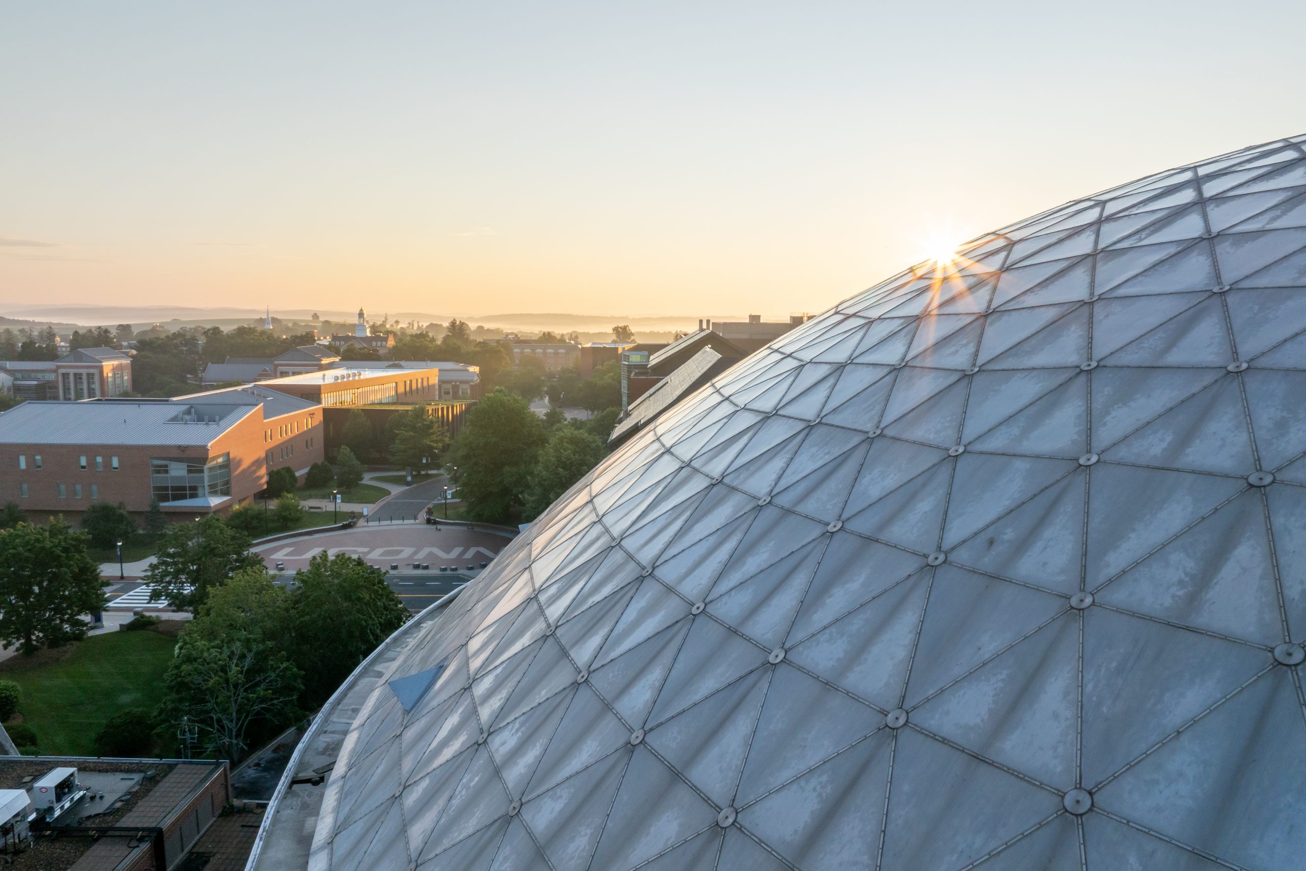 The sun rises on the UConn Storrs campus on Monday, July 28, 2025. (Sydney Herdle/UConn Photo)